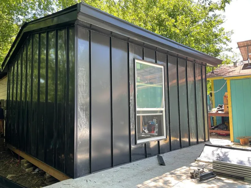 Black standing seam metal wall panels for Metal Roof Installation in Southport