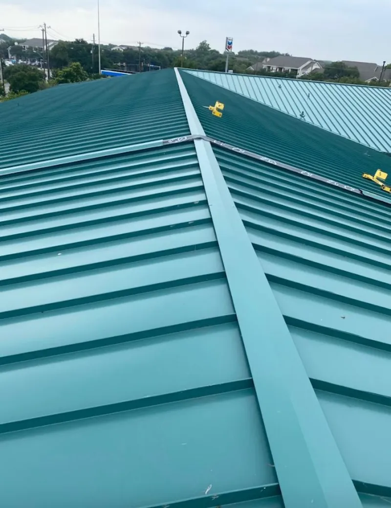 Green commercial metal roof ridge and valley for Metal Roof Repair in Southport